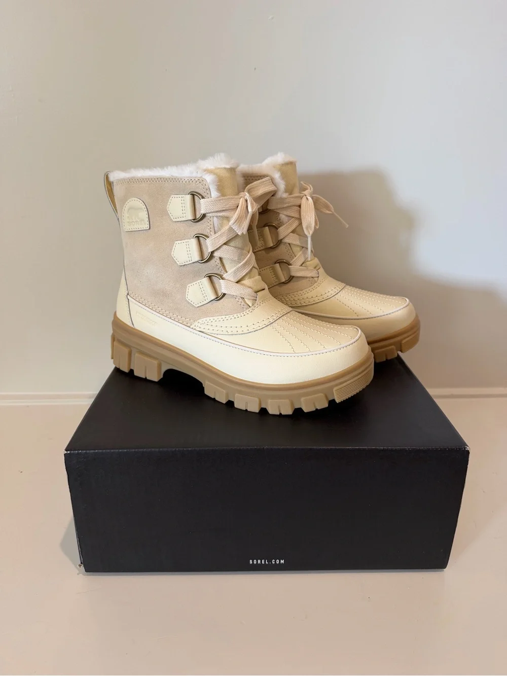 Sorel Cream and Tan Winter Lace-Up Boots with Faux Fur Collar